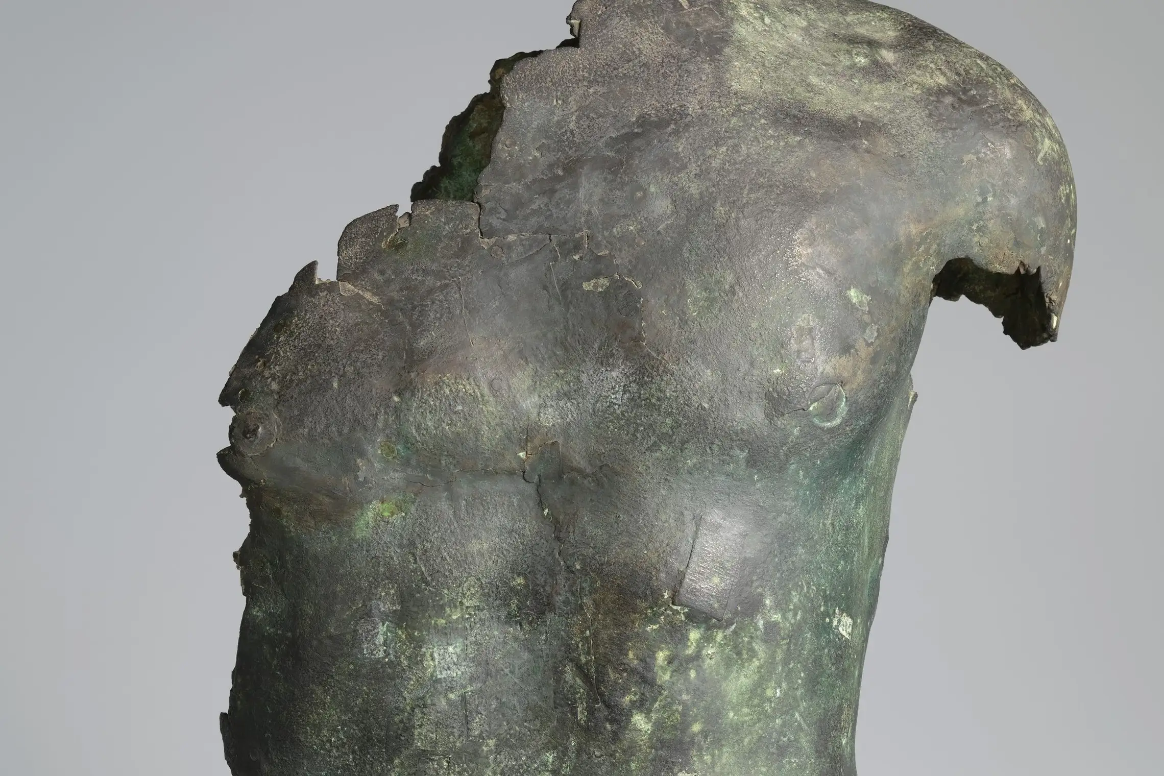 Cropped - Bronze torso of a youth