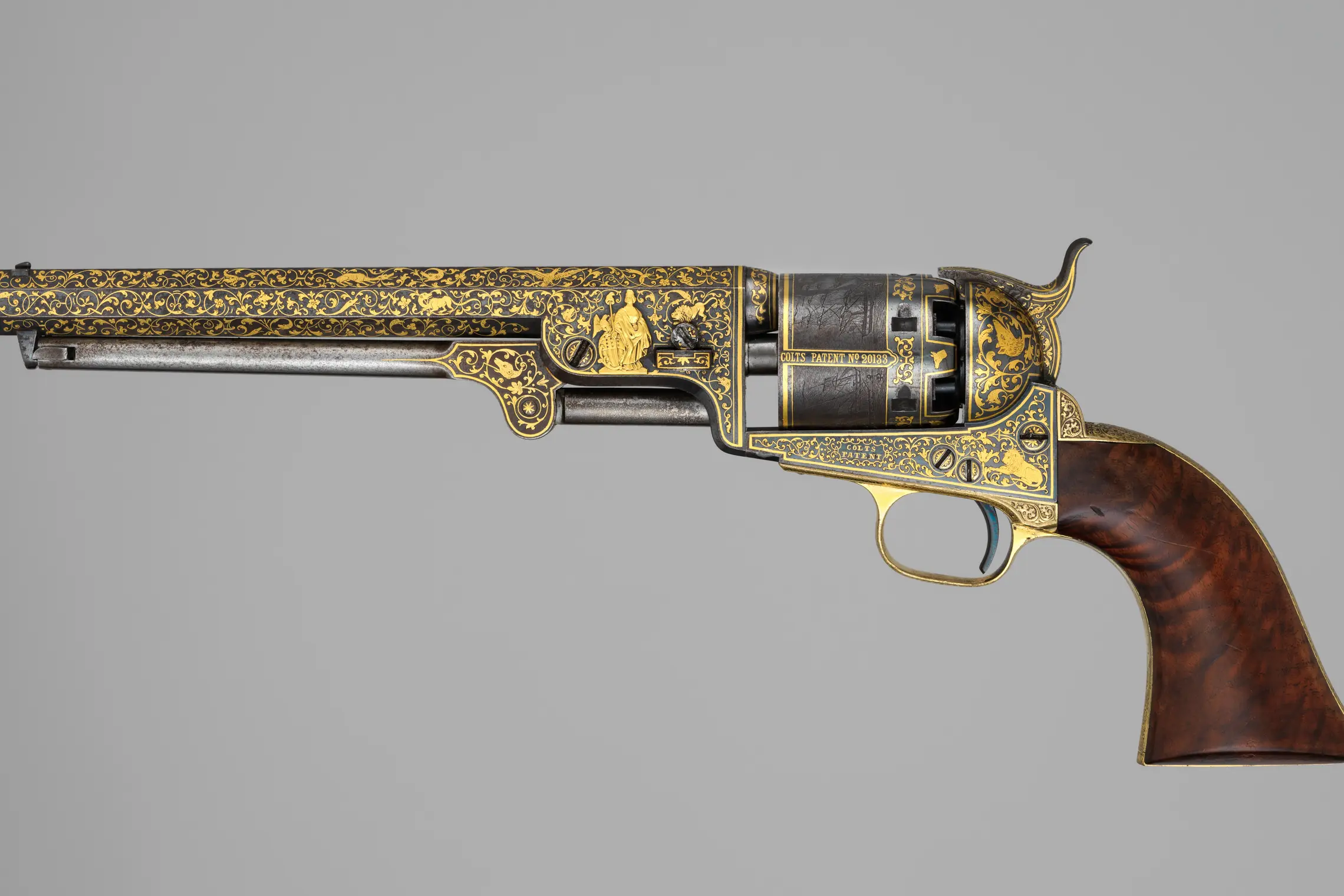 Gold-inlaid Colt Model 1851 Navy Revolver (serial no. 20133), with Case and Accessories